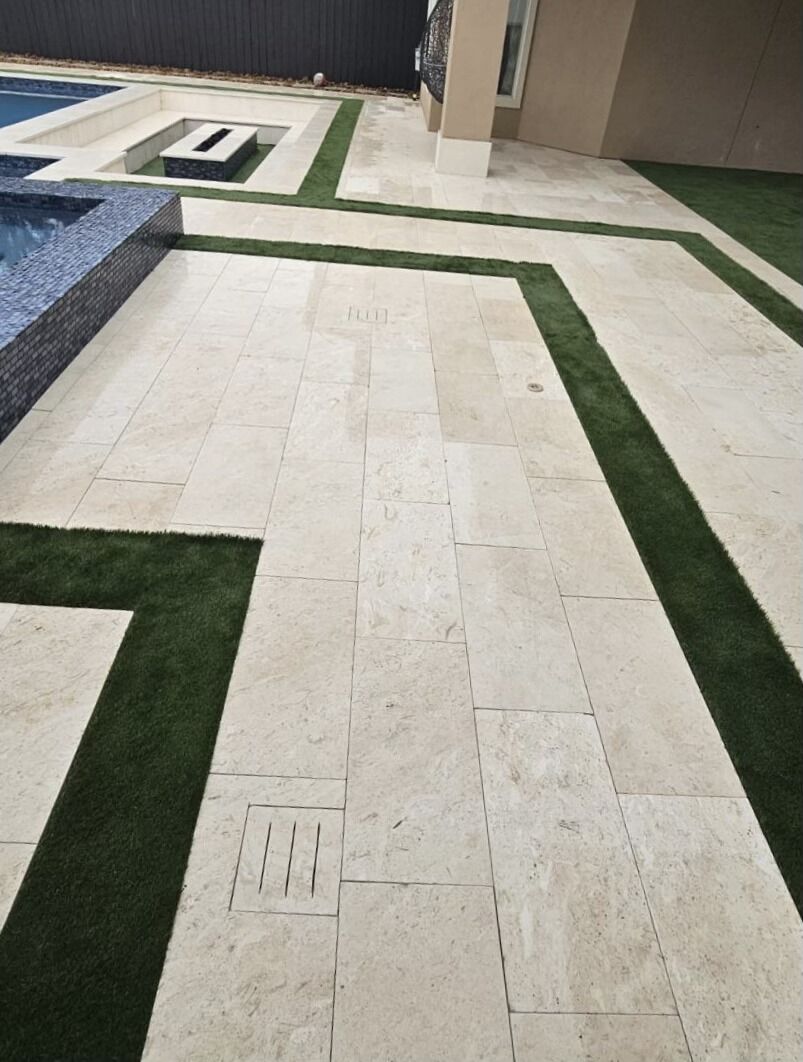 Covered paver patio with outdoor living